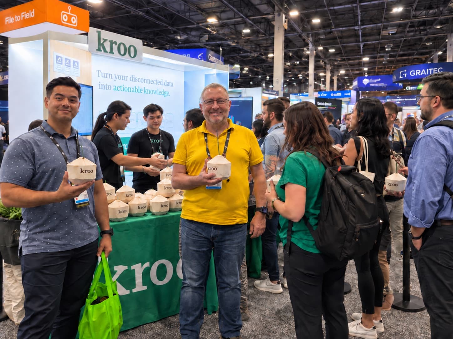 Staff handing branded coconuts to guests at an event